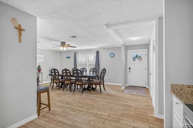 a view of a storage and utility room with washer and dryer