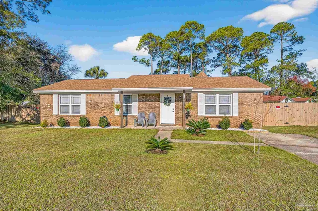 a front view of a house with a porch