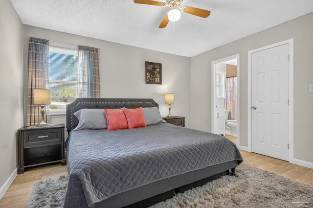 a en suite bathroom with a sink and a mirror