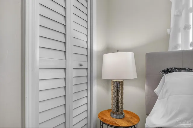 swimming pool view with a seating space