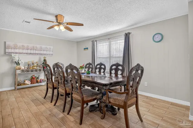 a view of a dining room with furniture