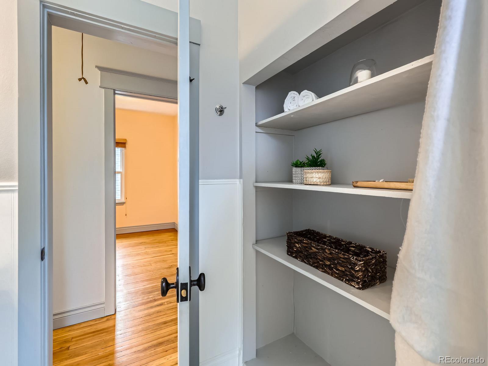 3833 Umatilla Street Denver, CO 80211 - Photo 29 of 50 a walk in closet and view of bathroom