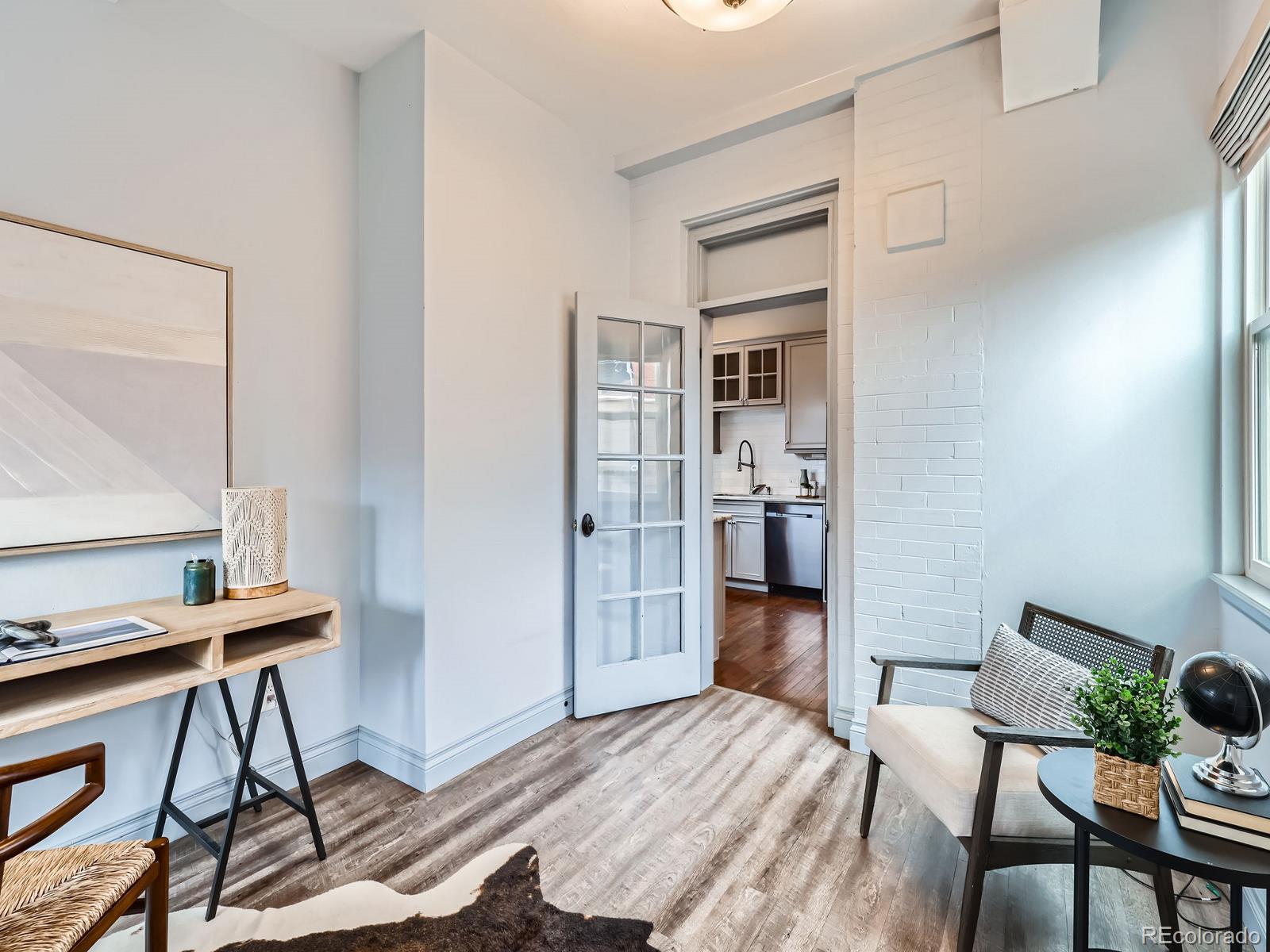 3833 Umatilla Street Denver, CO 80211 - Photo 39 of 50 a bedroom with furniture and a window