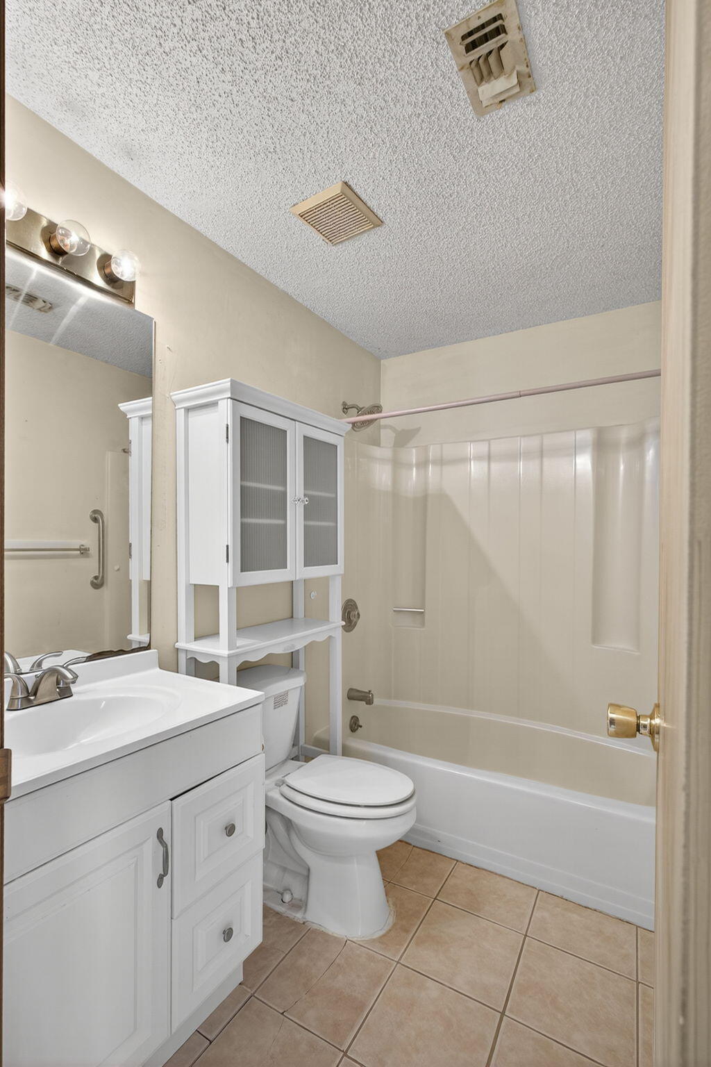 1332 West 33rd Street Riviera Beach, FL 33404 - Photo 16 of 25 a bathroom with a double vanity sink toilet mirror and shower