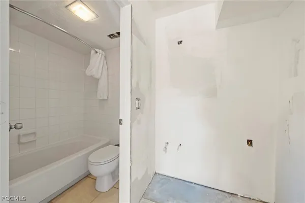 a view of a street with sitting area