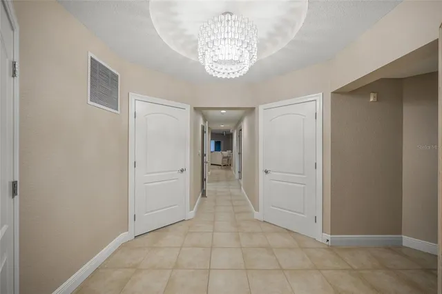 a view of a hallway with an empty room