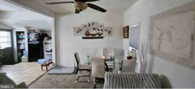 264 Birch Street Penns Grove, NJ 08069 - Photo 4 of 8 a view of a dining room with furniture and chandelier