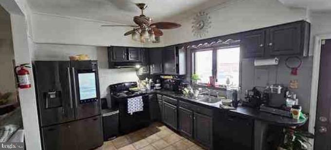 264 Birch Street Penns Grove, NJ 08069 - Photo 5 of 8 a kitchen with a refrigerator a sink and dishwasher