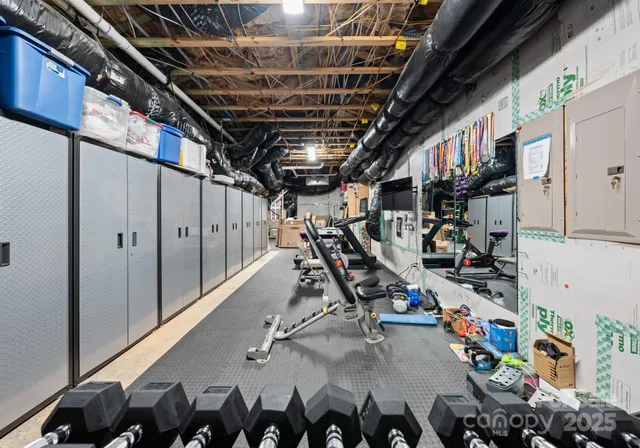 a view of a chairs and table in the balcony