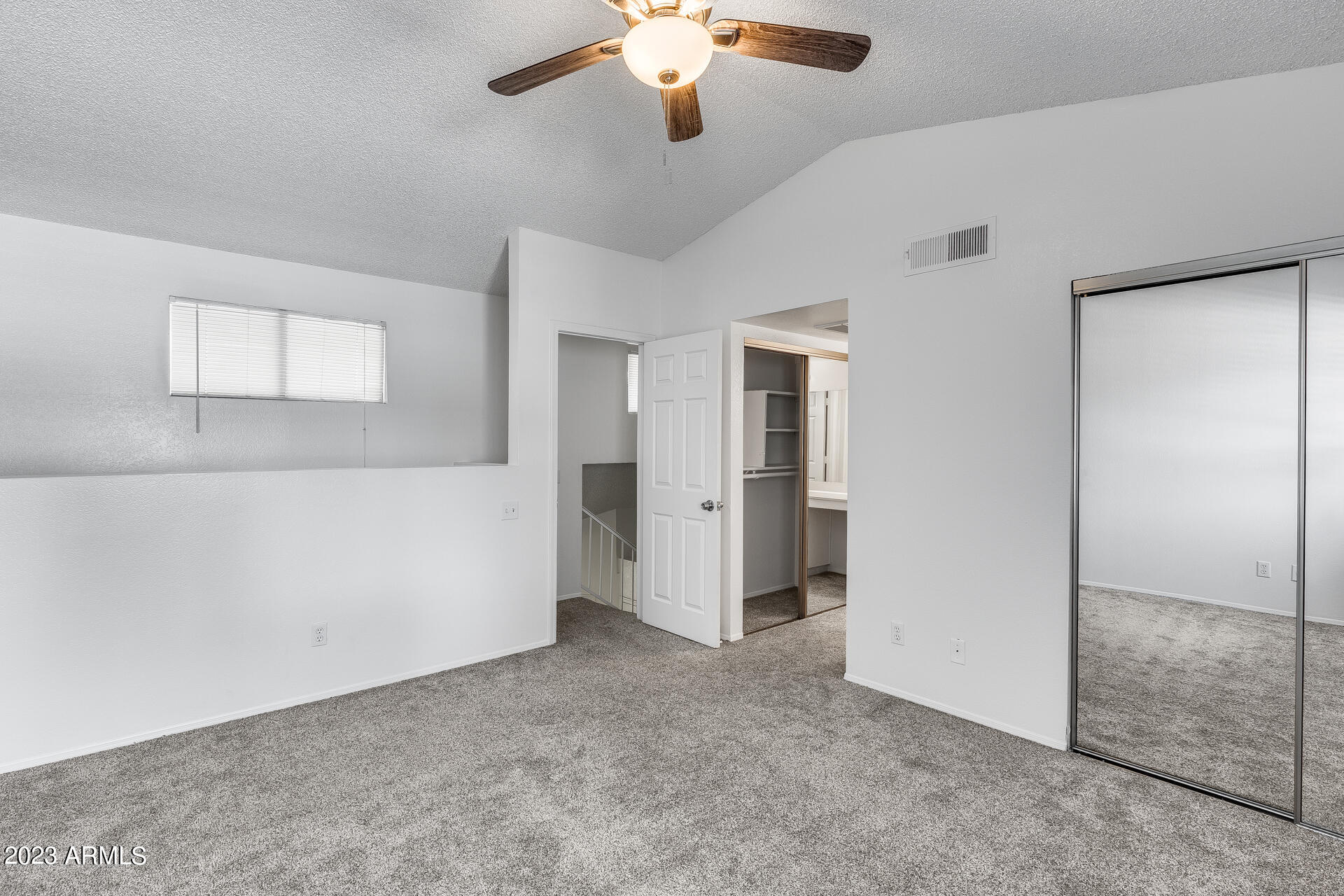 170 East Guadalupe Road, Unit 77 Gilbert, AZ 85234 - Photo 23 of 31 a view of a livingroom with a chandelier fan