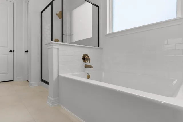 a bathroom with bathtub
