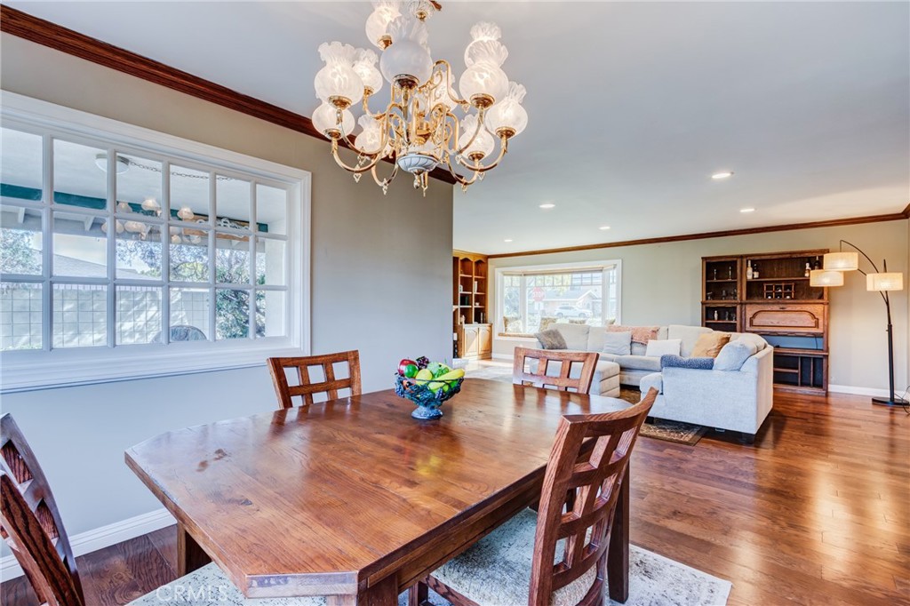 2757 Puente Street Fullerton, CA 92835 - Photo 17 of 71 a view of a dining room with furniture wooden floor and chandelier