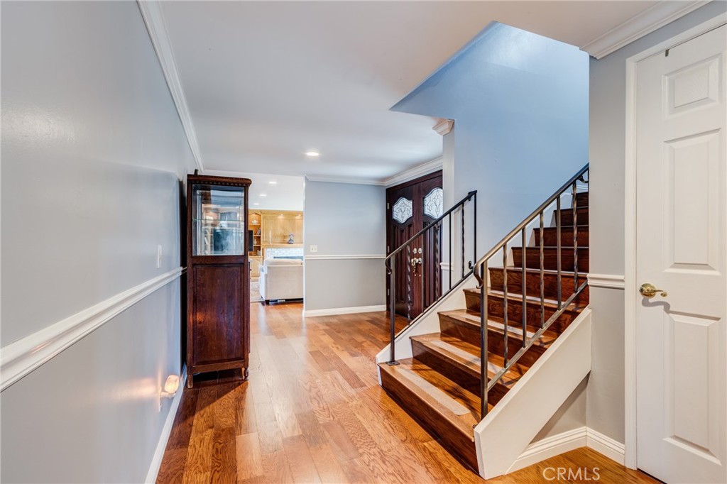2757 Puente Street Fullerton, CA 92835 - Photo 28 of 71 a view of entryway and hall with wooden floor
