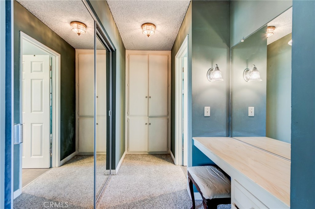 2757 Puente Street Fullerton, CA 92835 - Photo 33 of 71 a en suite bathroom with a sink shower and a mirror