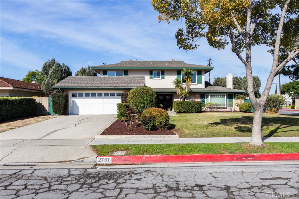 2757 Puente Street Fullerton, CA 92835 - Photo 4 of 71 a front view of a house with street