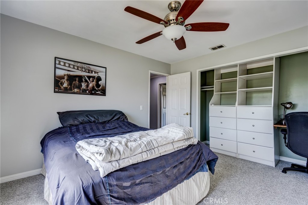 2757 Puente Street Fullerton, CA 92835 - Photo 42 of 71 a bedroom with a bed and a cabinets