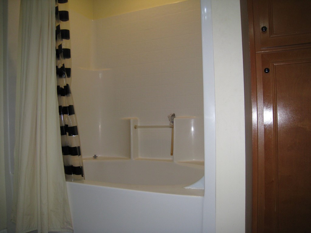 3007 Alamo Court Columbus, GA 31907 - Photo 18 of 24 a bathroom with bathtub and shower