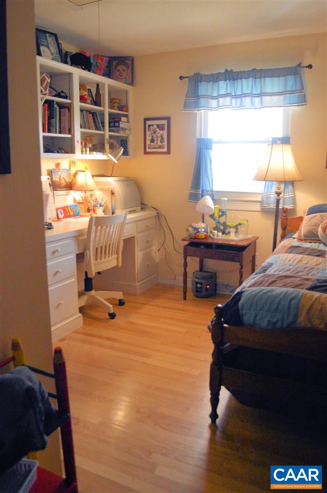 2409 Wakefield Road Charlottesville, VA 22901 - Photo 17 of 35 a room with gym equipment and a window