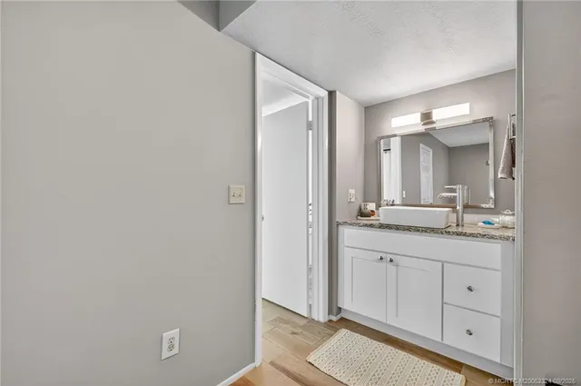 a bathroom with a shower and a tub