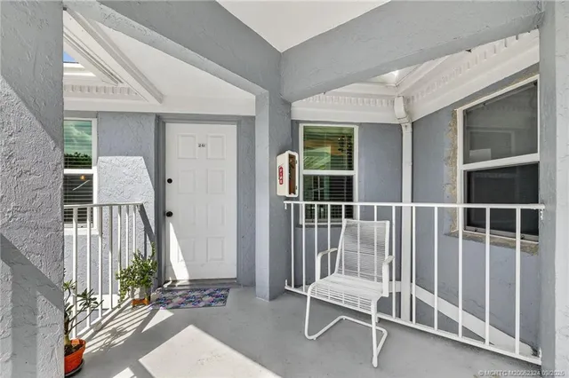 a view of a balcony with door