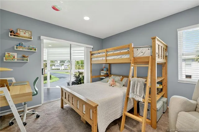 a bedroom with a bed and a cabinets