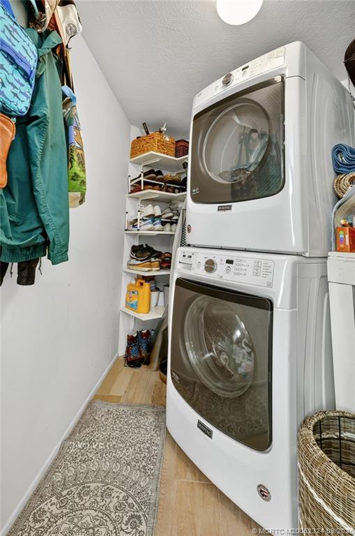 3260 Southeast Aster Lane, Unit I241 Stuart, FL 34994 - Photo 36 of 48 a utility room with dryer and washer