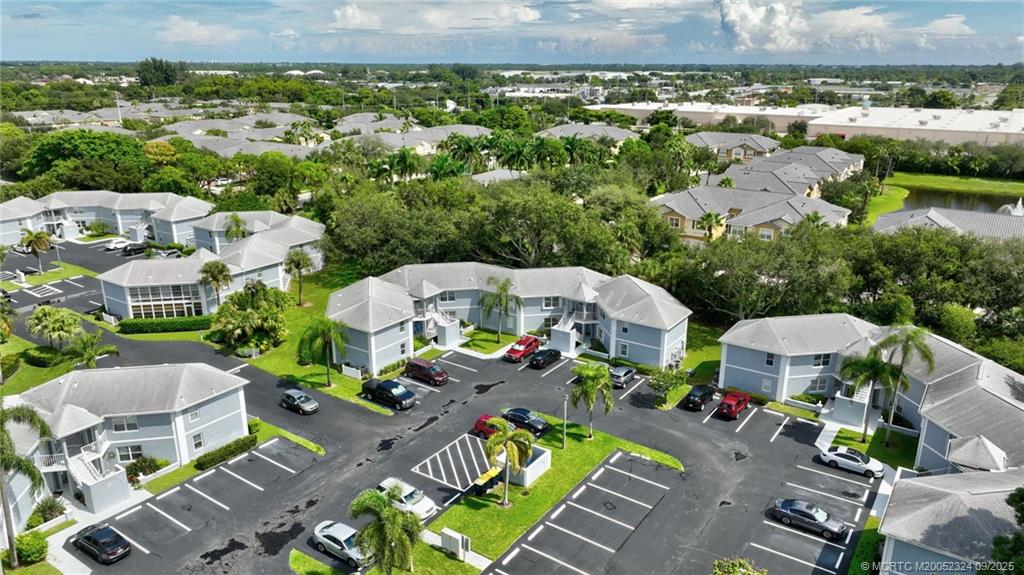 3260 Southeast Aster Lane, Unit I241 Stuart, FL 34994 - Photo 39 of 48 an aerial view of multiple house