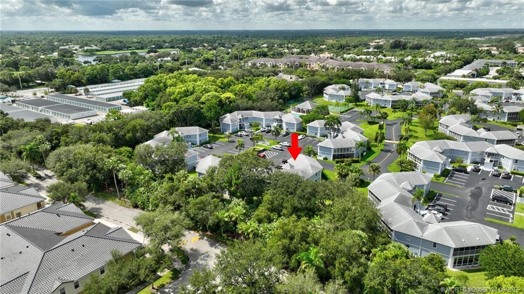 3260 Southeast Aster Lane, Unit I241 Stuart, FL 34994 - Photo 43 of 48 a view of a house with a outdoor space