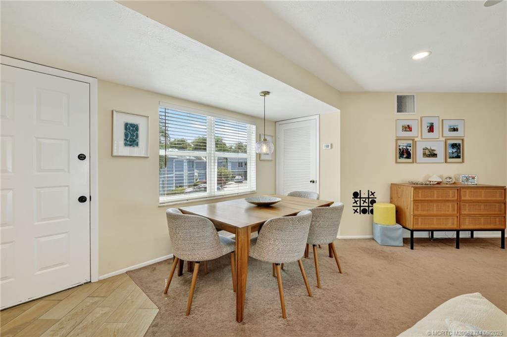 3260 Southeast Aster Lane, Unit I241 Stuart, FL 34994 - Photo 8 of 48 a view of a livingroom with furniture and a window
