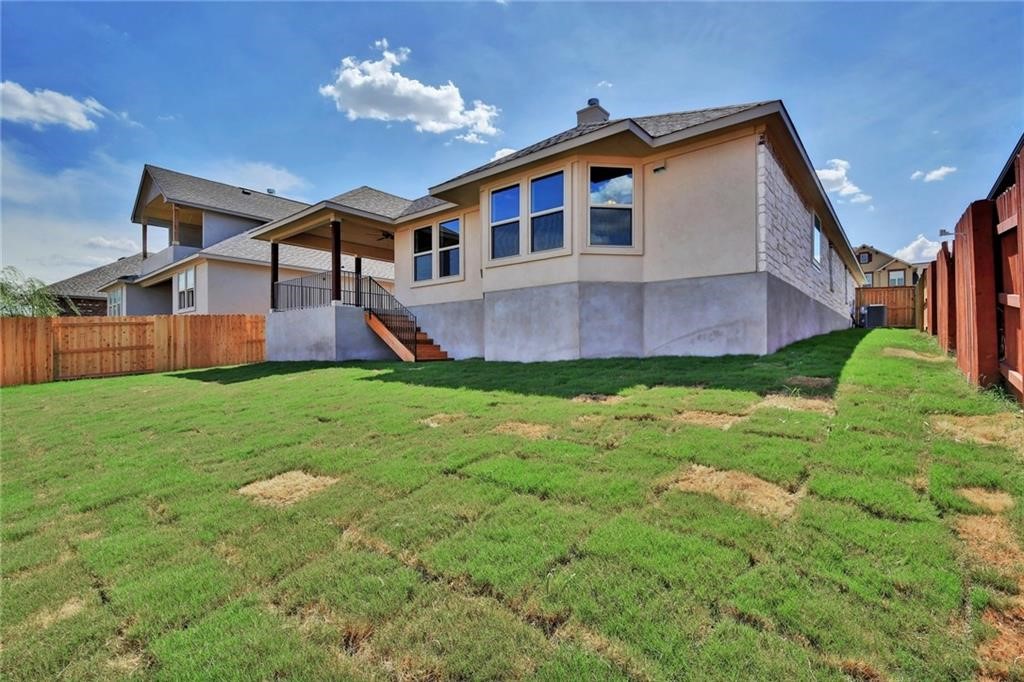 2208 Cabrillo Path Leander, TX 78641 - Photo 23 of 23 a front view of a house with a yard and garage
