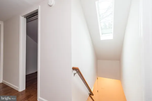 a view of a hallway with windows