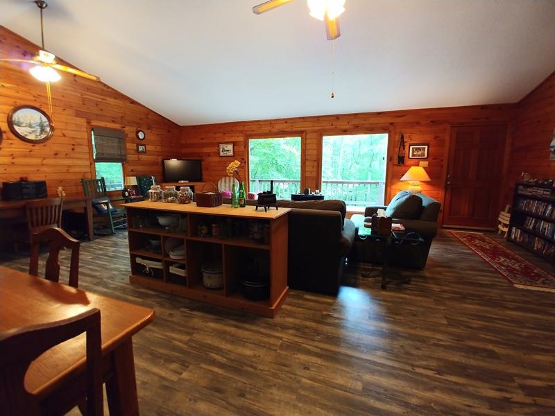 607 Dryhill Road Ferrum, VA 24088 - Photo 11 of 27 a living room with furniture a fireplace and a large window