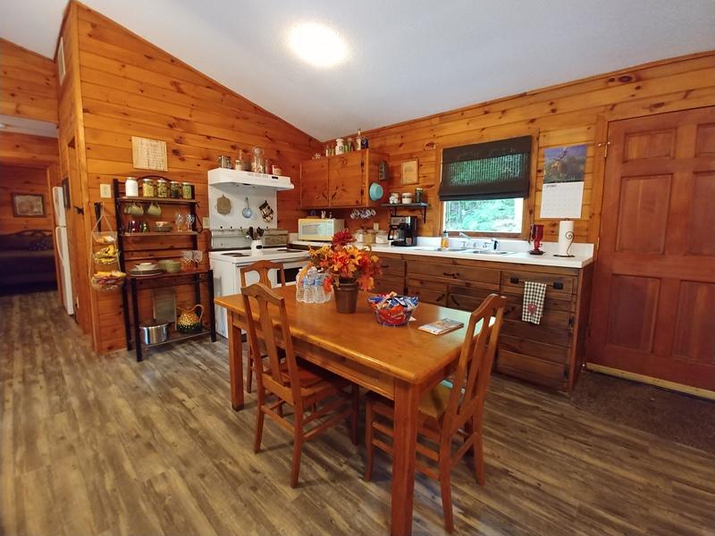 607 Dryhill Road Ferrum, VA 24088 - Photo 13 of 27 a view of a dining room with furniture and wooden floor