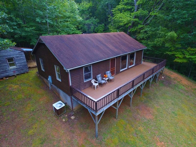 607 Dryhill Road Ferrum, VA 24088 - Photo 6 of 27 a backyard of a house with table and chairs