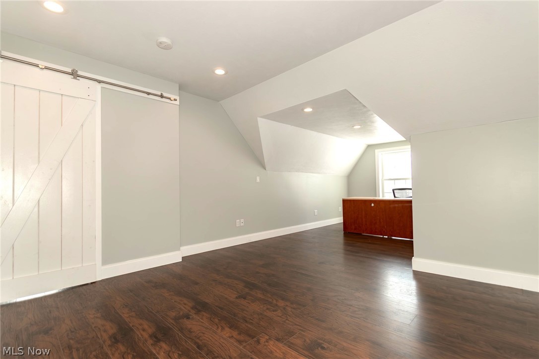 18919 Ravenna Road Chagrin Falls, OH 44023 - Photo 19 of 48 Bedroom 2 with wood flooring and a large dormer nook, a perfect spot
for a desk
