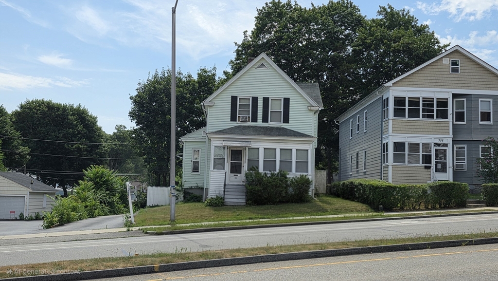 360 Hamilton Street Worcester, MA 01604 - Photo 2 of 35 a front view of a house with a garden