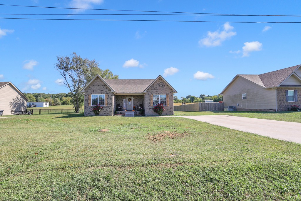 228 Scattersville Road Portland, TN 37148 - Photo 2 of 29 a front view of a house with a yard