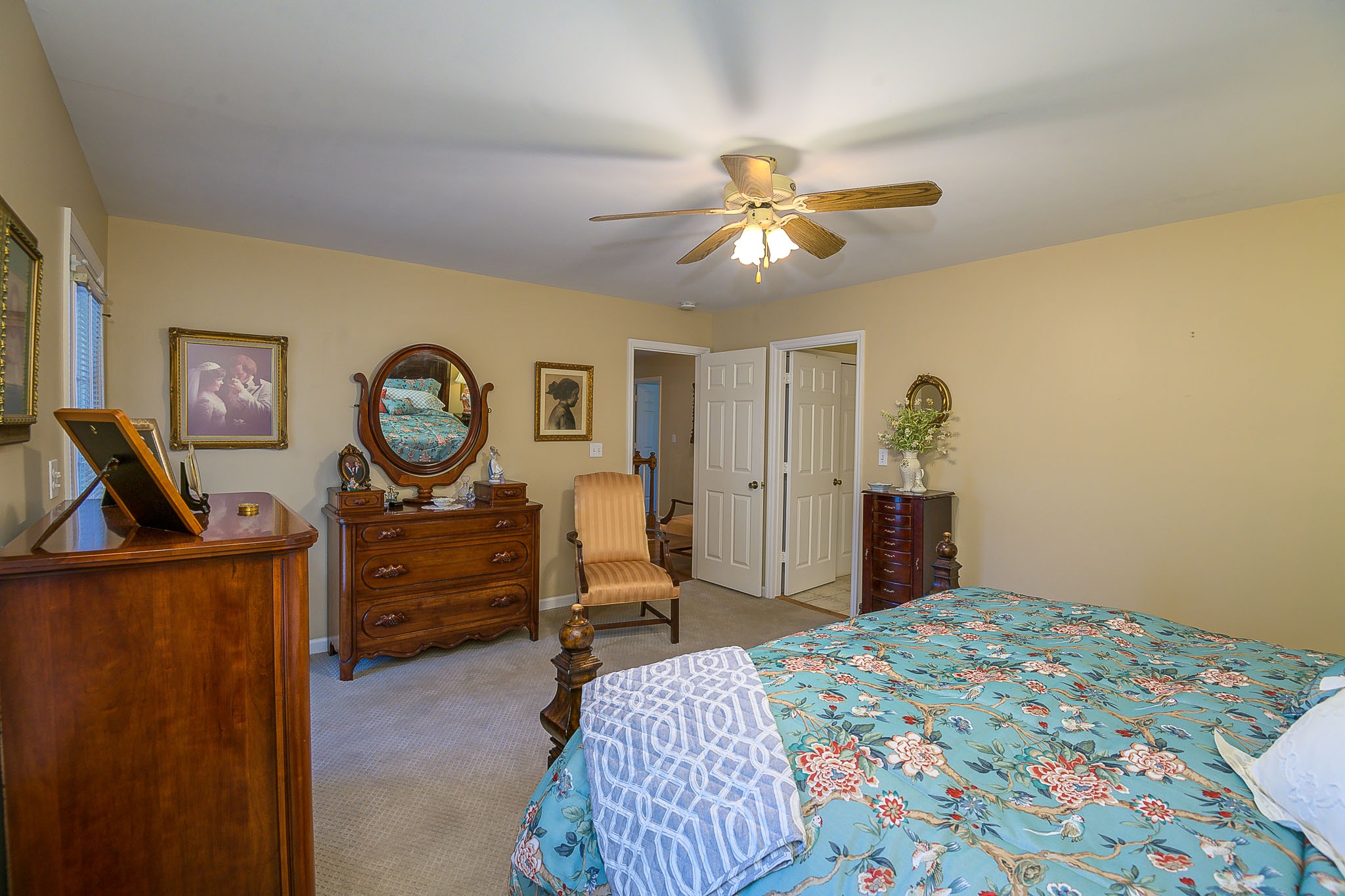 4685 Highway 64 Rutherfordton, NC 28139 - Photo 36 of 50 a bedroom with a bed and a chandelier