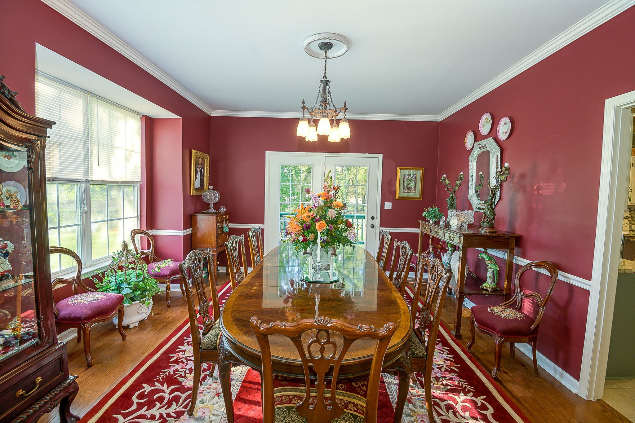 4685 Highway 64 Rutherfordton, NC 28139 - Photo 8 of 50 a view of a dining room with furniture a chandelier and wooden floor