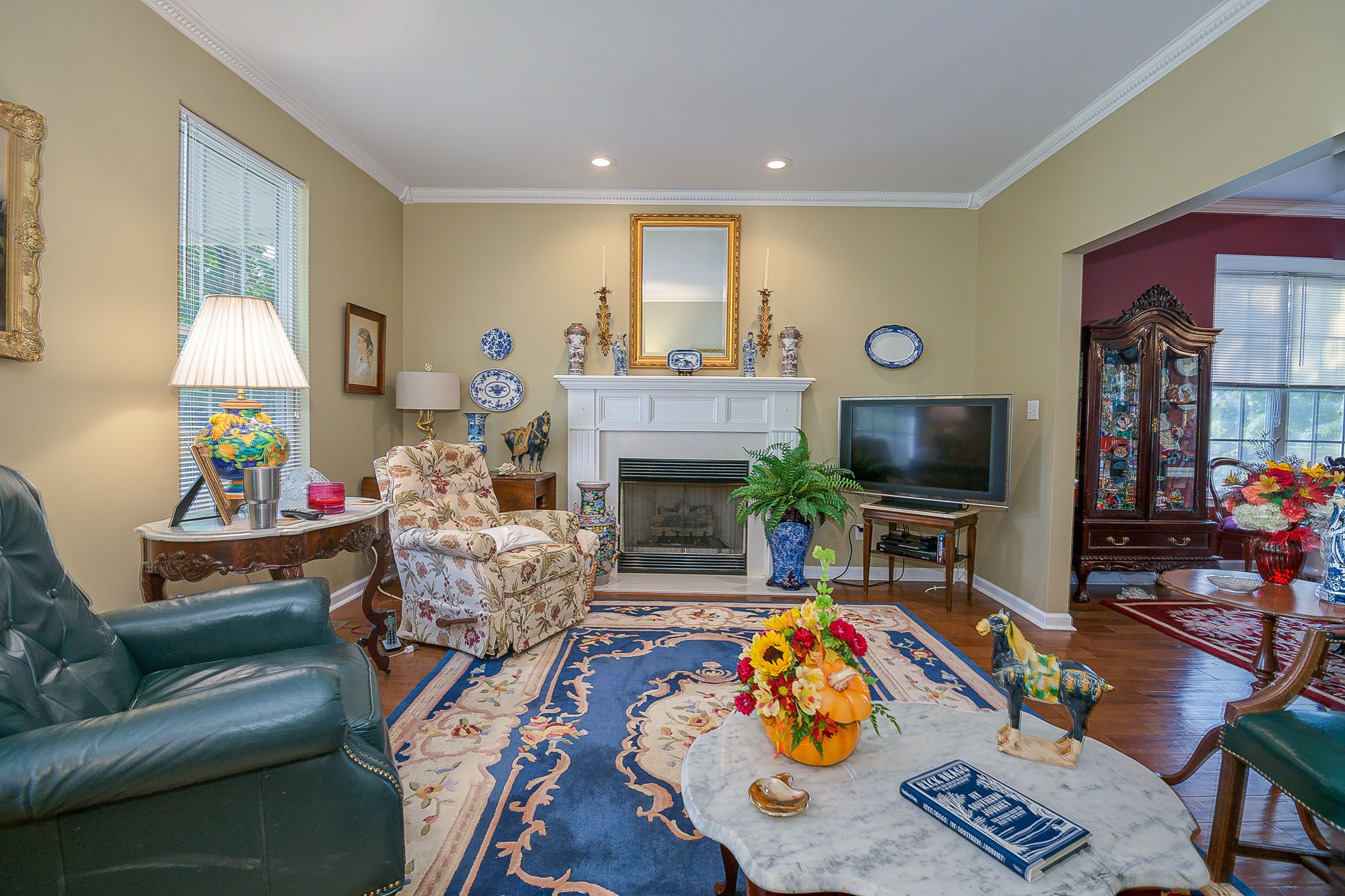 4685 Highway 64 Rutherfordton, NC 28139 - Photo 10 of 50 a living room with furniture a flat screen tv and a fireplace
