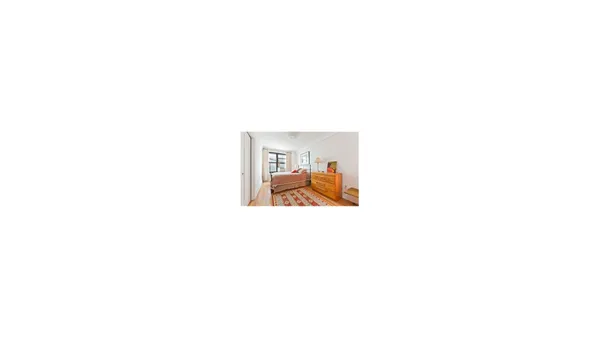 a picture of a room with a bench