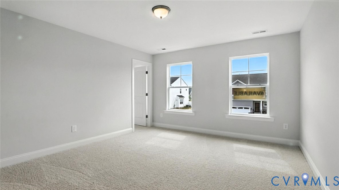 3164 Three Chopt Road Gum Spring, VA 23065 - Photo 10 of 13 an empty room with windows