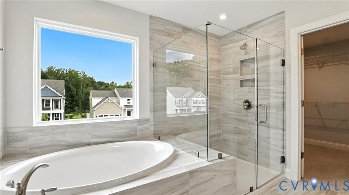 3164 Three Chopt Road Gum Spring, VA 23065 - Photo 10 of 15 a bathroom with a bathtub and a shower