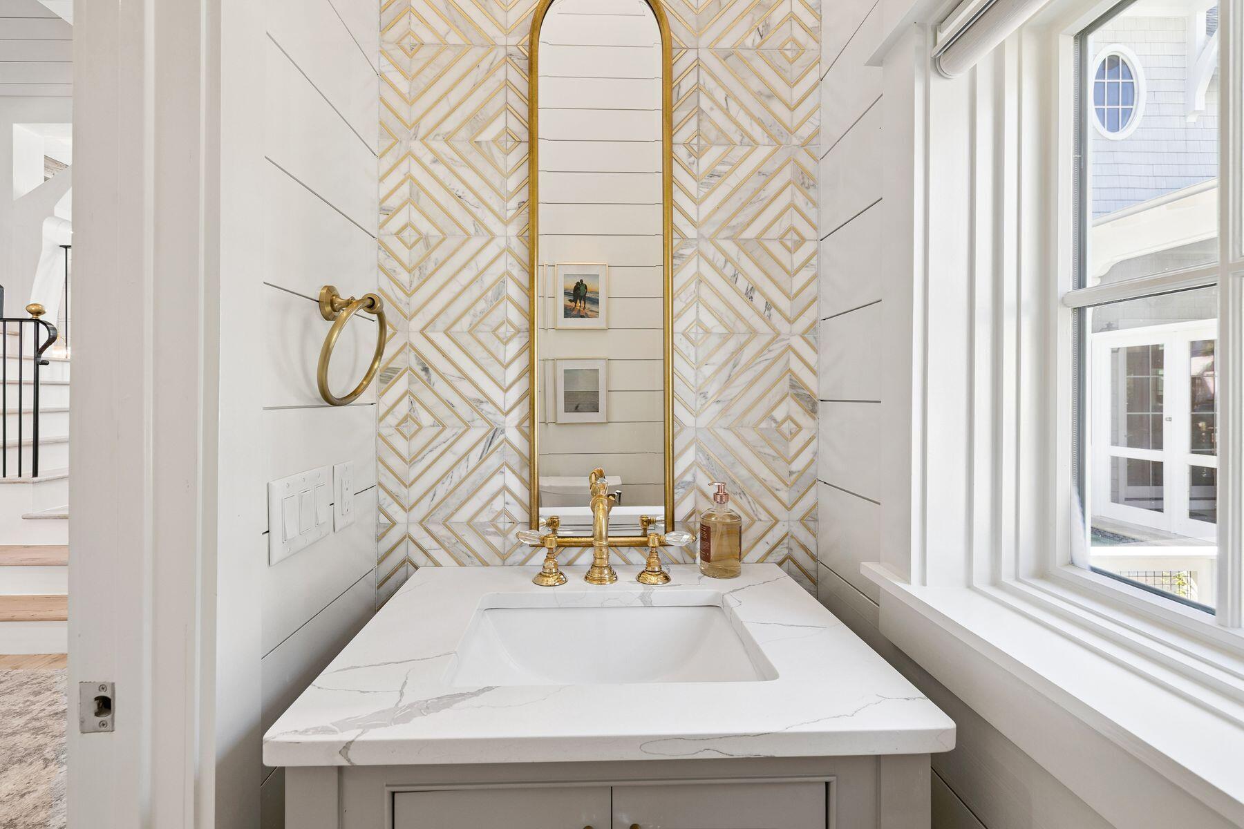 25 Peace Ln Inlet Beach Inlet Beach, FL 32461 - Photo 21 of 85 a bathroom with a sink and mirror with window