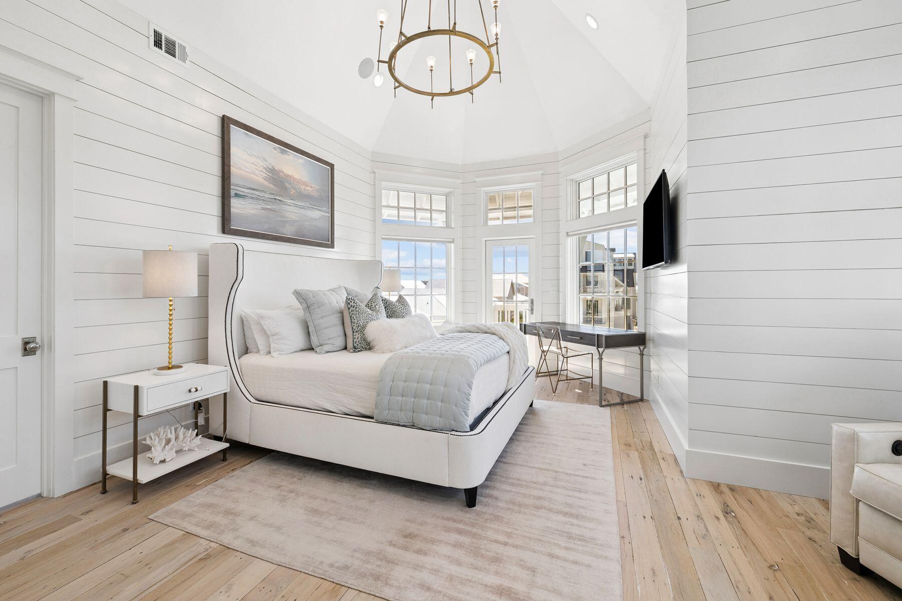 25 Peace Ln Inlet Beach Inlet Beach, FL 32461 - Photo 24 of 85 a spacious bedroom with a bed and a flat screen tv