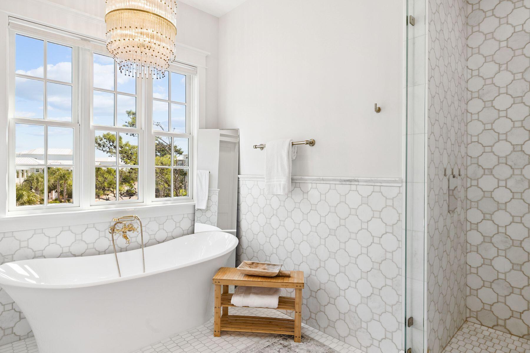 25 Peace Ln Inlet Beach Inlet Beach, FL 32461 - Photo 50 of 85 a bathroom with a bathtub and a window