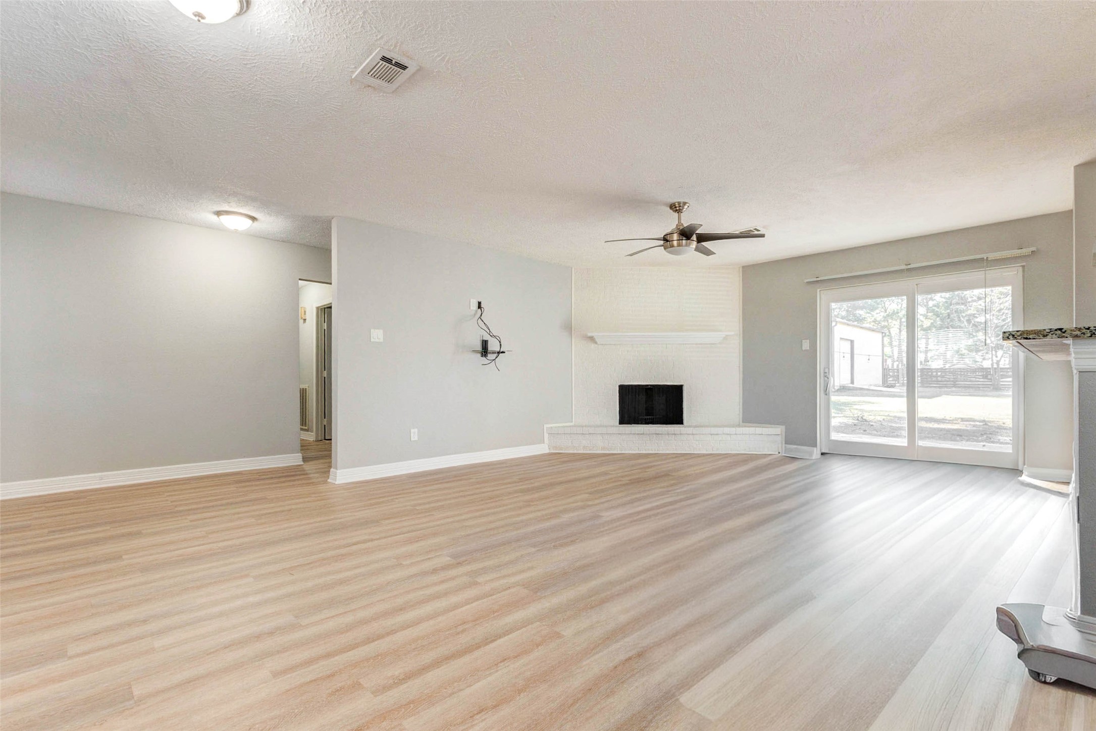 18526 Fenske Road Cypress, TX 77433 - Photo 10 of 32 The spacious layout accommodates a sectional or a sofa and loveseat arrangement, and the open design supports comfortable gatherings.