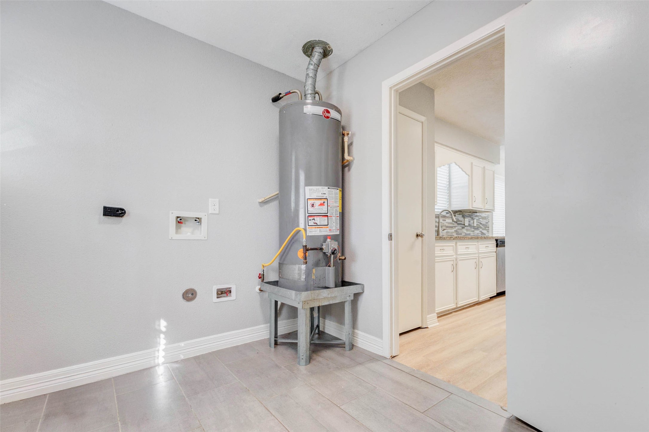18526 Fenske Road Cypress, TX 77433 - Photo 18 of 32 The mudroom also provides convenient access to the washer connections and water heater.