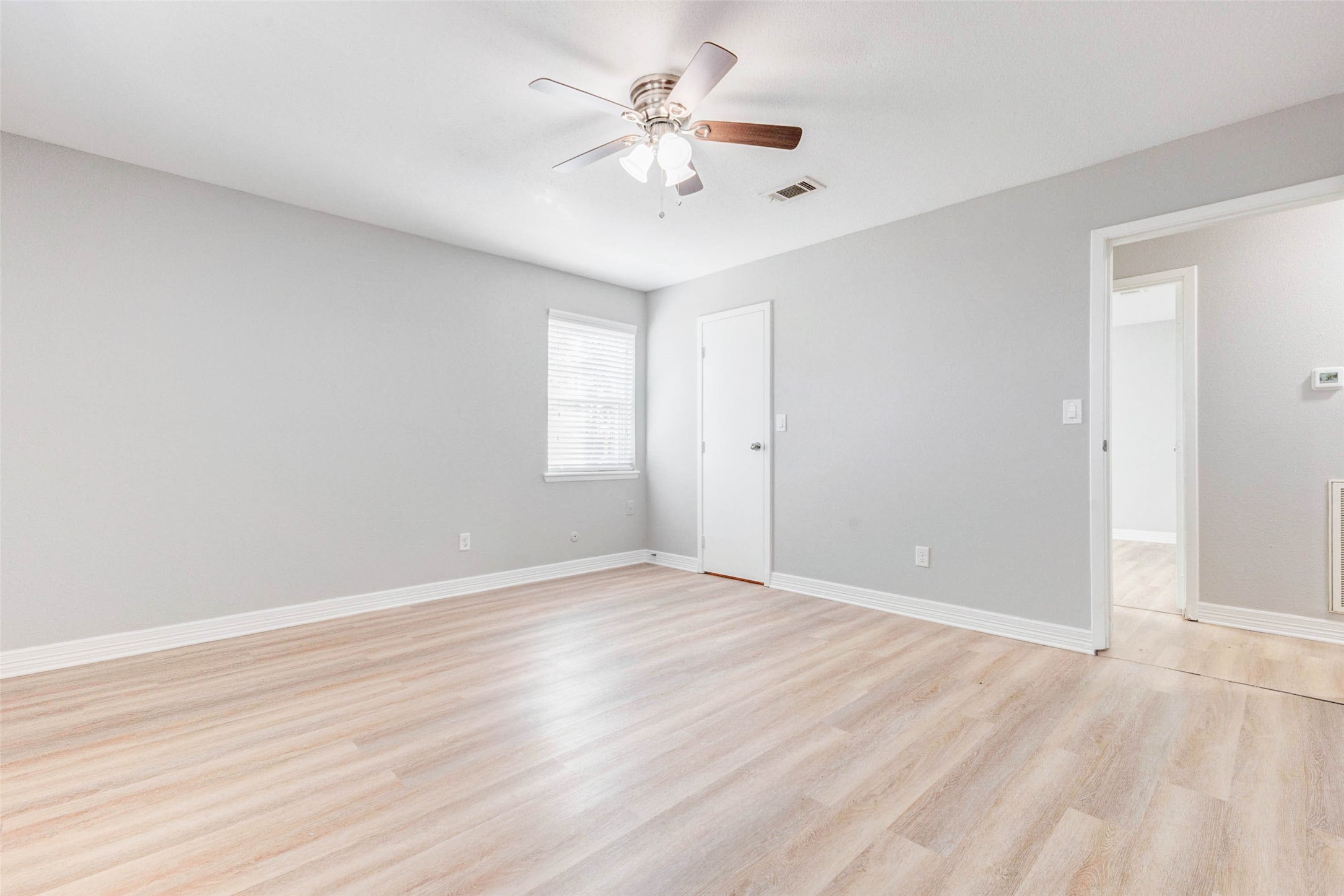 18526 Fenske Road Cypress, TX 77433 - Photo 21 of 32 An additional closet near the window provides convenient storage and organization. This room is ready for you to make it your own!