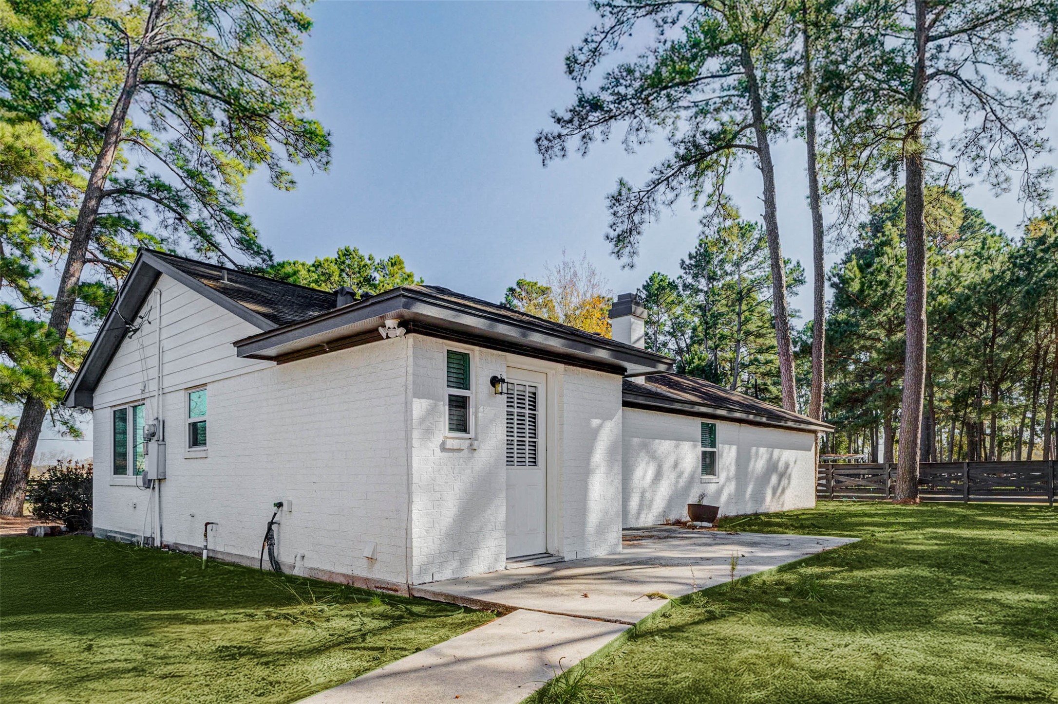 18526 Fenske Road Cypress, TX 77433 - Photo 29 of 32 Step outside your back door to a concrete patio with space for outdoor seating or a grill. This private space is great for entertaining!